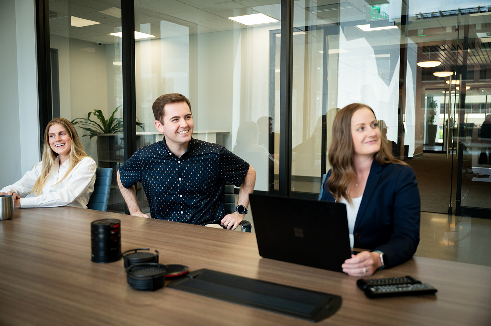 TELEO colleagues in a boardroom conversation